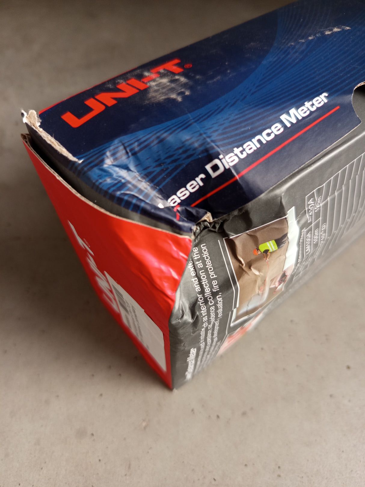 Měřič vzdálenosti UNI-T LM 50A - rozbaleno - pomačkaný obal